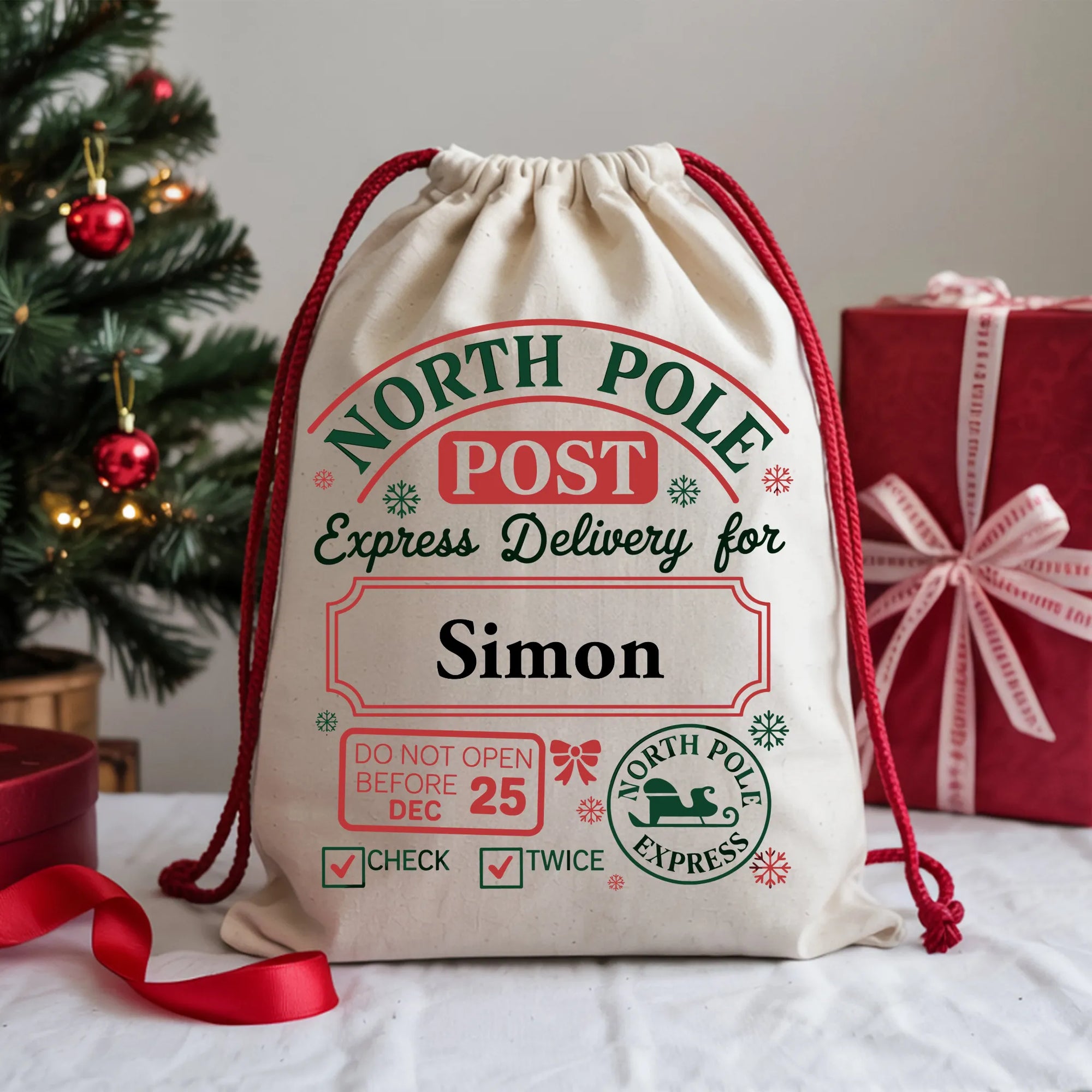 Custom Christmas gift sack with North Pole Post print and personalised name area