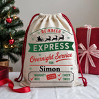 Custom Christmas gift sack featuring Reindeer Express overnight delivery artwork
