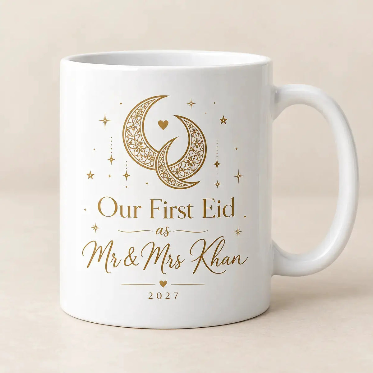 Personalised Our First Eid as Mr & Mrs mug with gold crescent moons and stars, featuring the surname Khan and year 2027 – newlywed Eid gift.