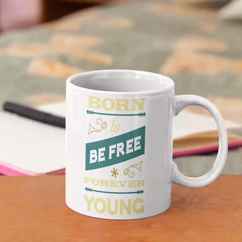 Born to Be Free Forever Young quote mug with blue interior and reverse personalisation available.