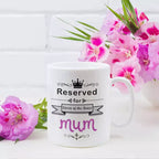 Personalised Reserved for the Queen of the House Mug featuring its printed design on a ceramic mug for Mother's Day