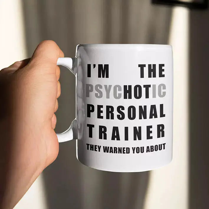 Personalised funny personal trainer ceramic mug featuring the “I'm The Psychotic/Hot Personal Trainer They Warned You About” quote.