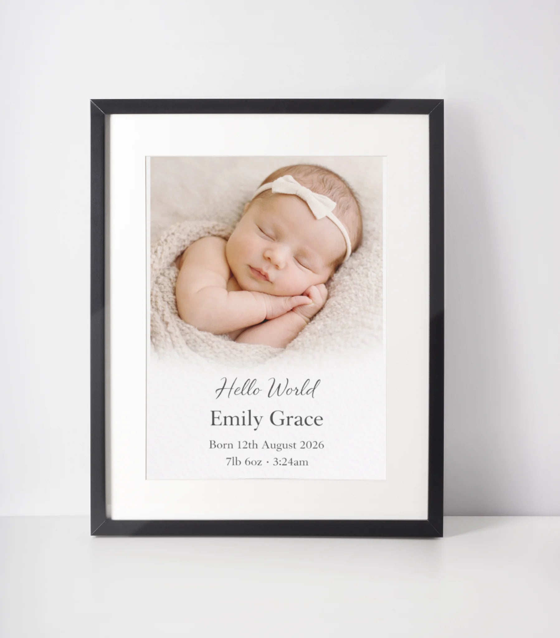 Personalised newborn baby birth details photo print with name, date, weight and time, elegant black framed nursery wall art UK