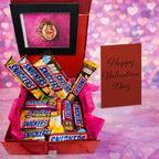 Personalised birthday chocolate box featuring Snickers peanut brownie bars in premium red hamper