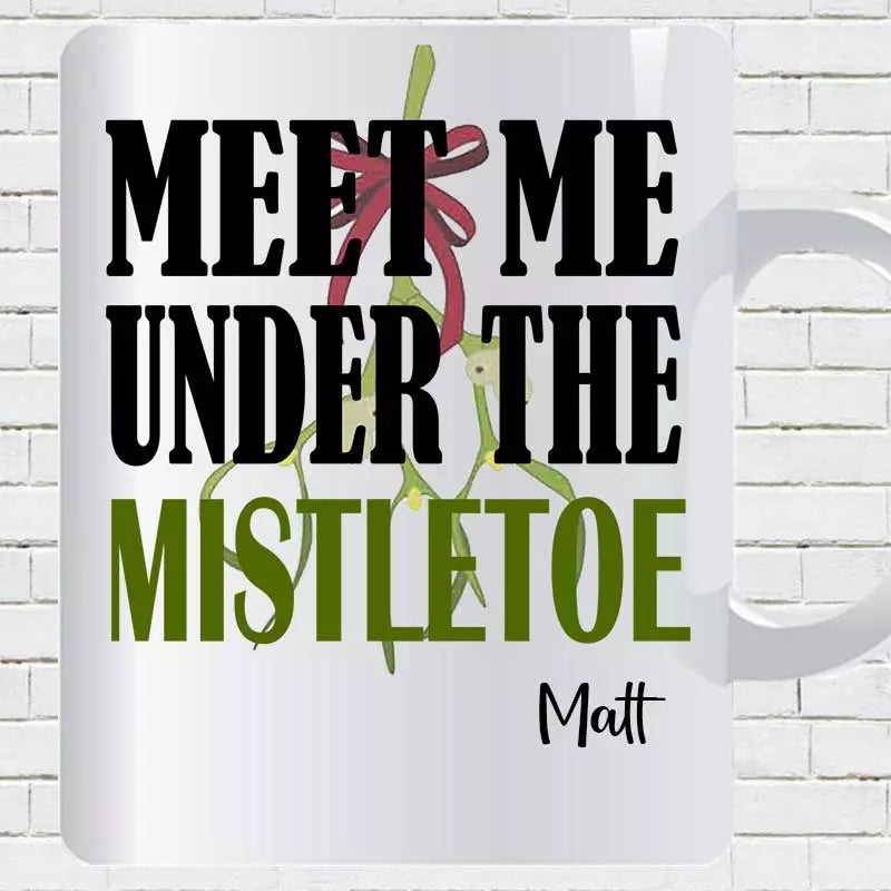 Meet Me Under the Mistletoe personalised Christmas mug with coloured interior and romantic festive design.