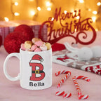 Personalised Santa alphabet Christmas mug featuring a festive initial and custom name on a white ceramic mug.