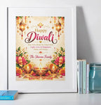 Personalised Diwali family blessings print in a white frame, featuring gold Happy Diwali lettering, glowing diyas, pink lotus flowers and a custom family name.
 Copy