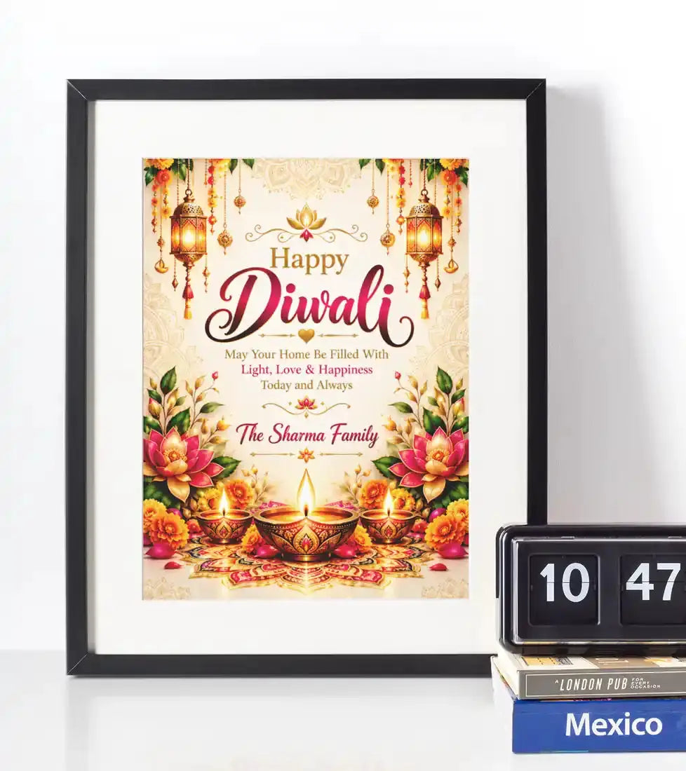 Personalised Diwali family name wall art in a black frame, featuring a heartfelt festive blessing, golden lanterns, colourful flowers and traditional diyas.