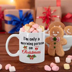 Funny Christmas ceramic mug featuring the I'm Only a Morning Person on Christmas slogan.