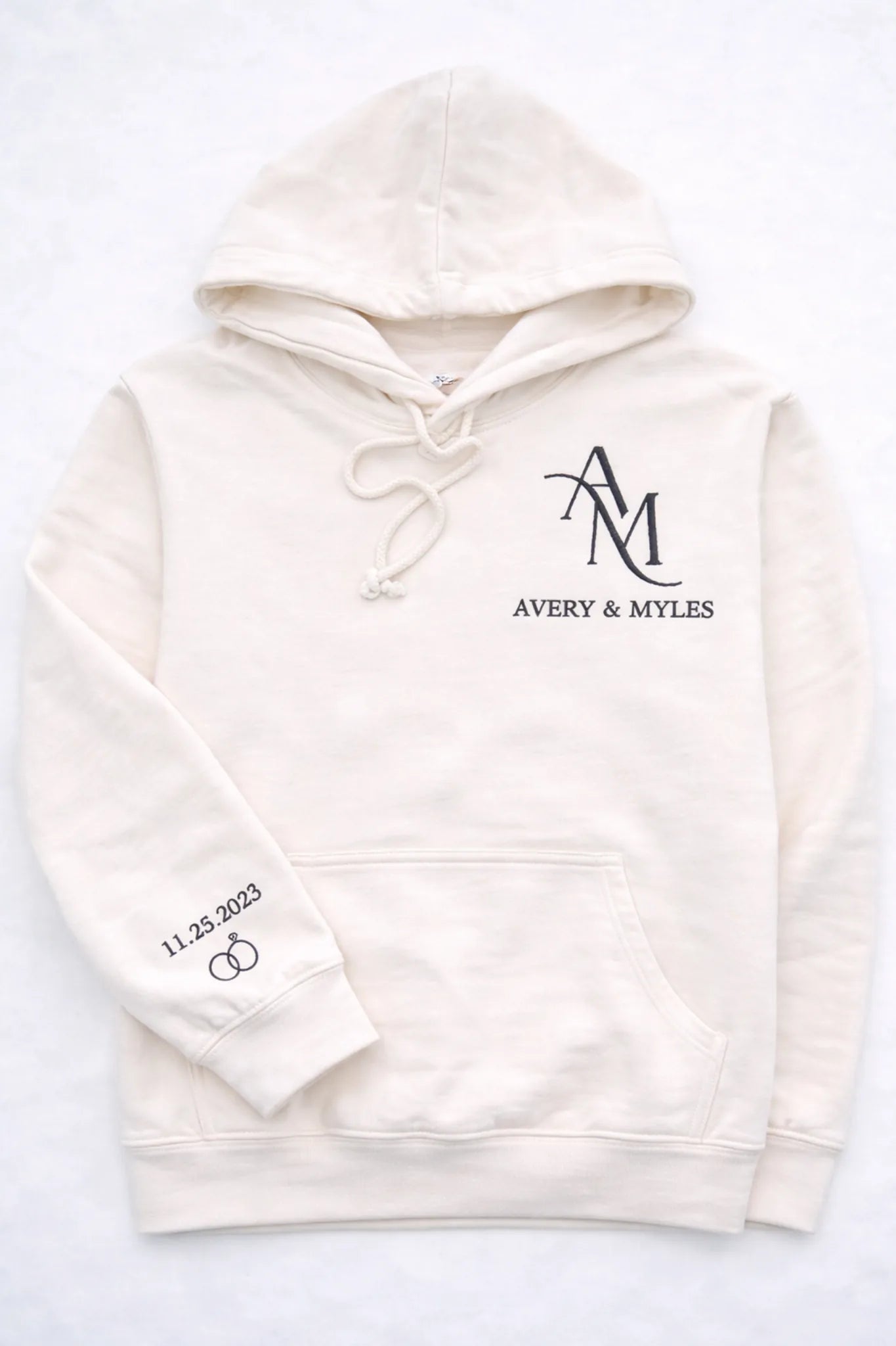 Personalised embroidered initials hoodie with custom names and date sleeve detail, romantic couple gift