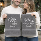 Couple holding personalised Mr Right and Mrs Always Right towels with embroidered names