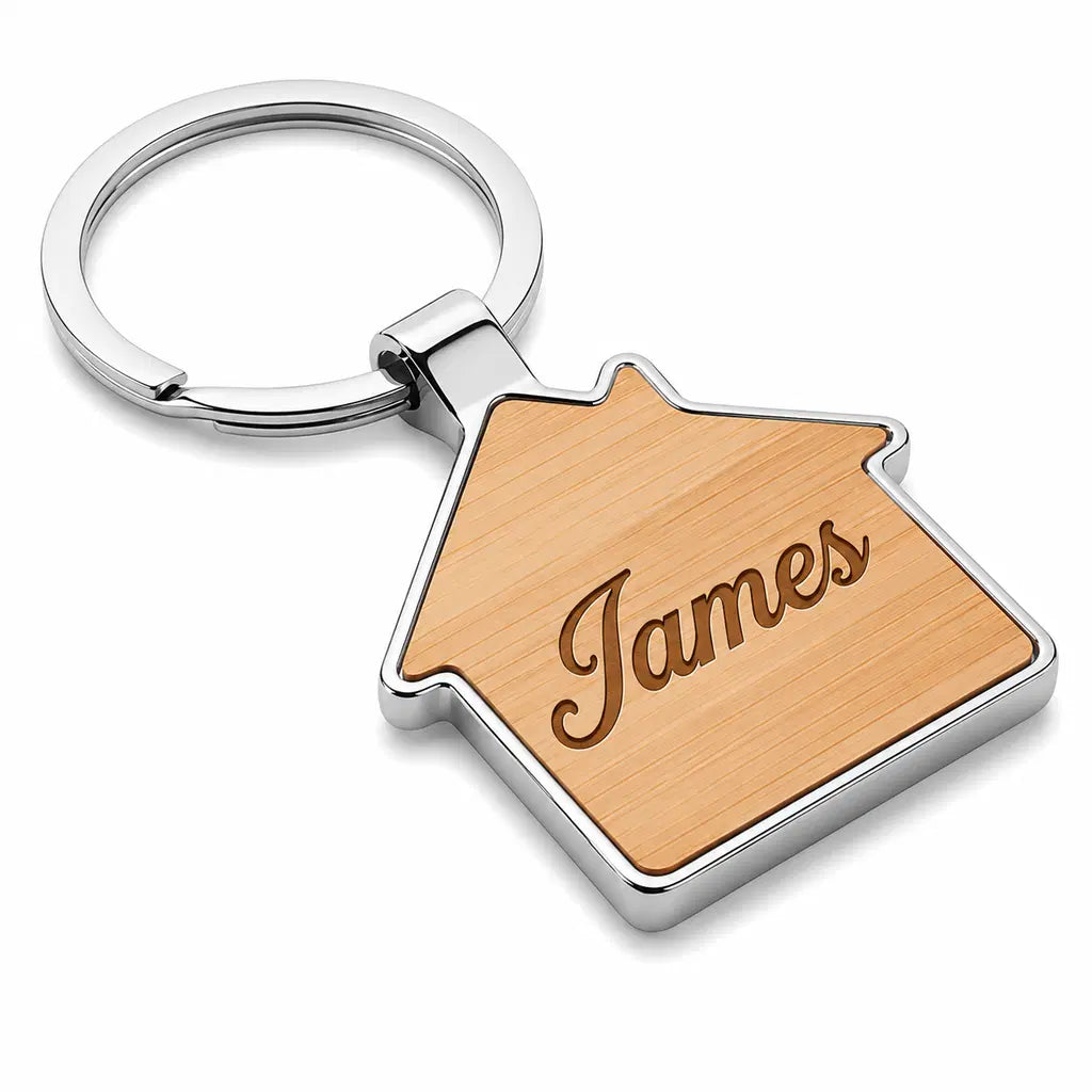 Personalised house shaped name keyring with bamboo-style centre and custom name