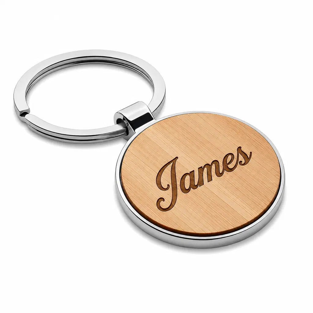 Personalised round name keyring with bamboo-style centre and custom name