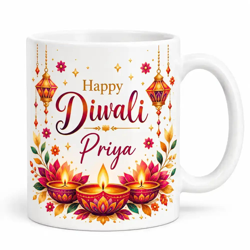 Personalised Happy Diwali white ceramic mug with custom name, colourful hanging lanterns, glowing diyas and festive floral decorations.
