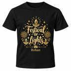 Black personalised Diwali T-shirt with gold Festival of Lights lettering, diya lamps, fireworks and lotus details, featuring the name Rohan.