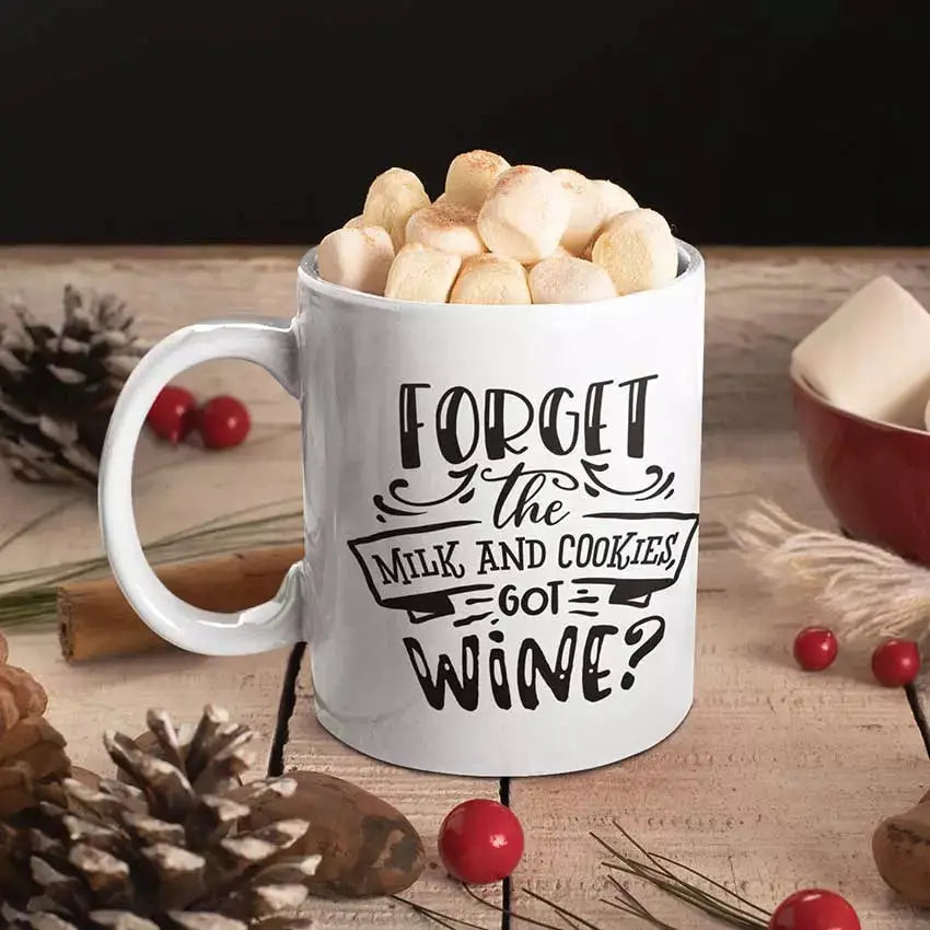 Funny personalised Christmas wine mug featuring the slogan Forget Milk and Cookies Got Wine on a white ceramic mug.