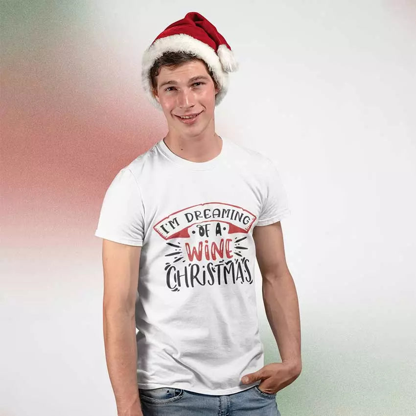 Person wearing a white t-shirt with 'I'm Dreaming of a Wine Christmas' text and a Santa hat on a gradient background.