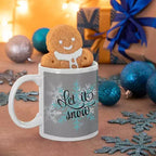 Personalised Let It Snow Christmas ceramic mug with festive winter artwork and a custom name printed on the reverse.