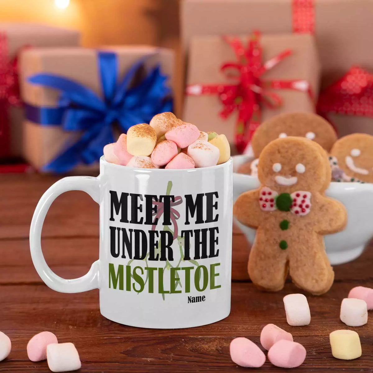 Personalised Meet Me Under the Mistletoe Christmas mug with romantic festive lettering on a white ceramic mug.