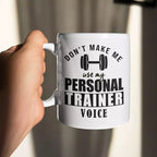 White ceramic mug printed with “Don't Make Me Use My Personal Trainer Voice”, a funny personalised gift for a fitness coach or gym instructor.