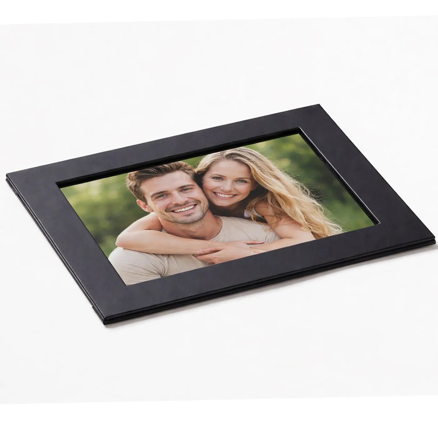 Personalised photo frame mockup with romantic couple photograph inside black matt frame, ideal anniversary photo frame gift for couples, engagement memories, wedding photos and personalised keepsake gift boxes.
