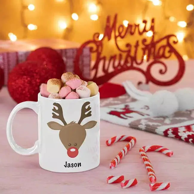 Personalised Rudolph the Reindeer Christmas mug with custom name and festive reindeer design on white ceramic.