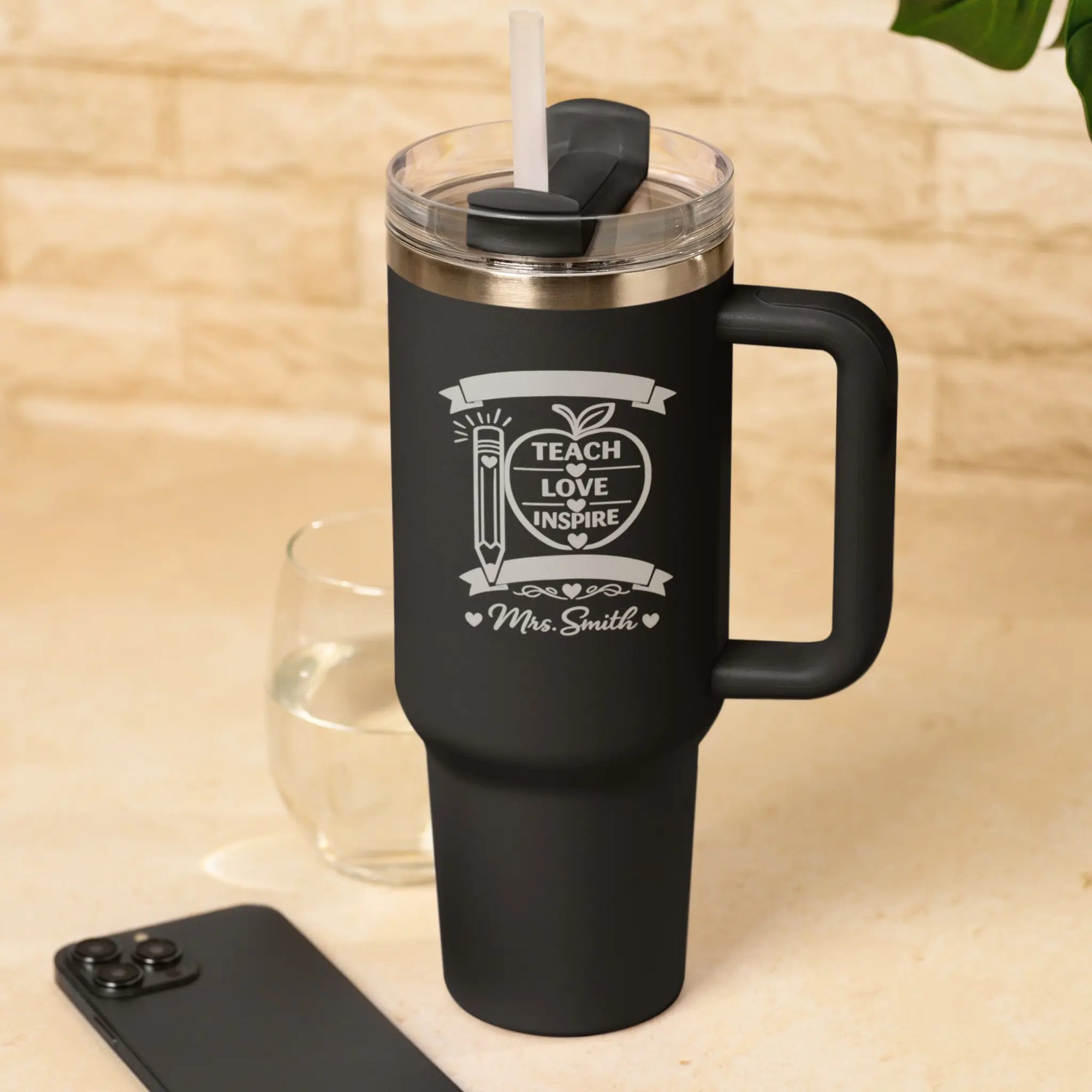 Personalised Teach Love Inspire Teacher Tumbler in Black engraved with teacher name, insulated stainless steel travel mug with handle and straw, thoughtful thank you teacher gift.