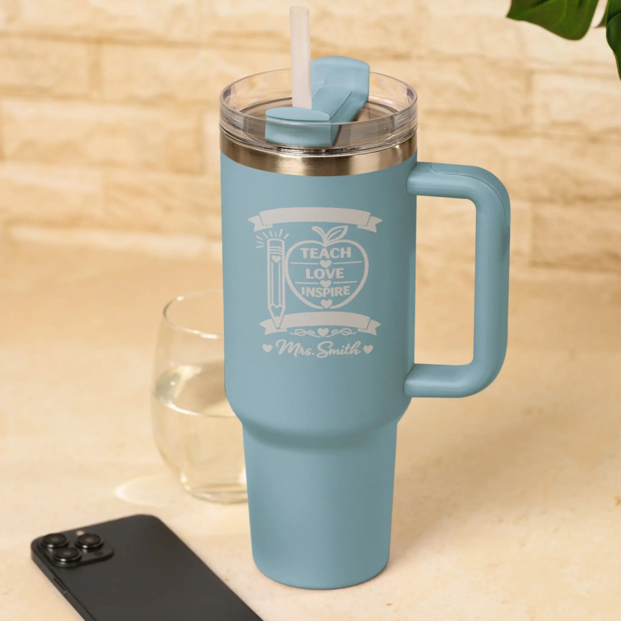 Personalised Teach Love Inspire Teacher Tumbler in Light Blue engraved with teacher name, insulated stainless steel travel mug with handle and straw, thoughtful thank you teacher gift.