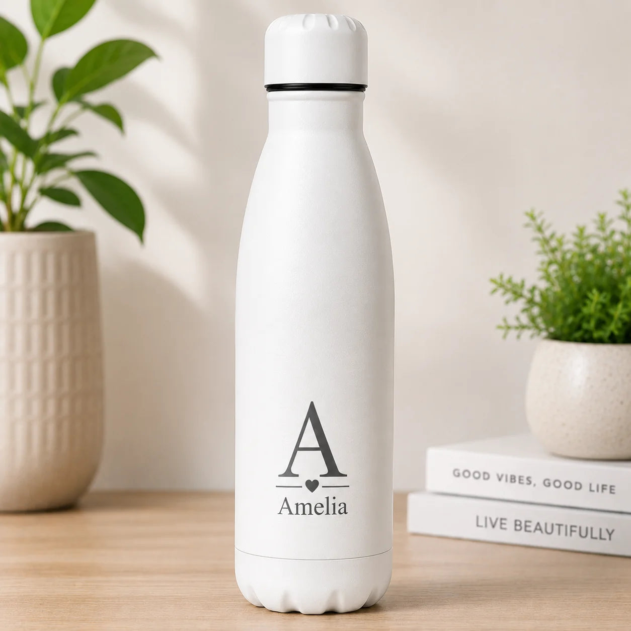 Personalised white insulated drinks bottle with custom engraved name and initial, ideal gift for weddings, teachers, bridesmaids or daily use