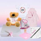 custom gift hamper for girl with babygrow, robe, teddy bear, bib and comforter and baby blanket. Ideal for newborns, birthdays, christening.