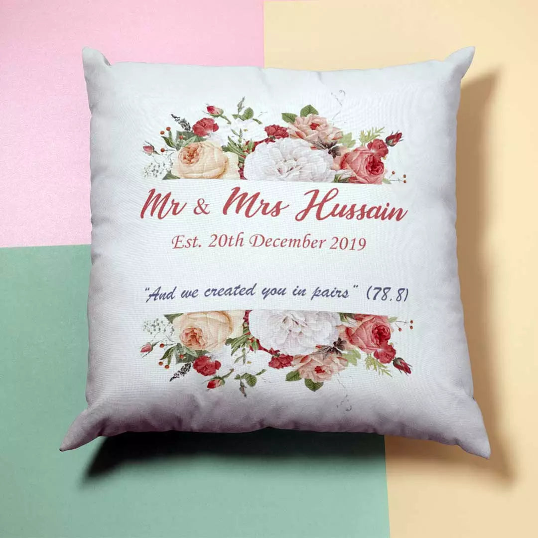 Personalised orange & white wreath cushion with custom names and date