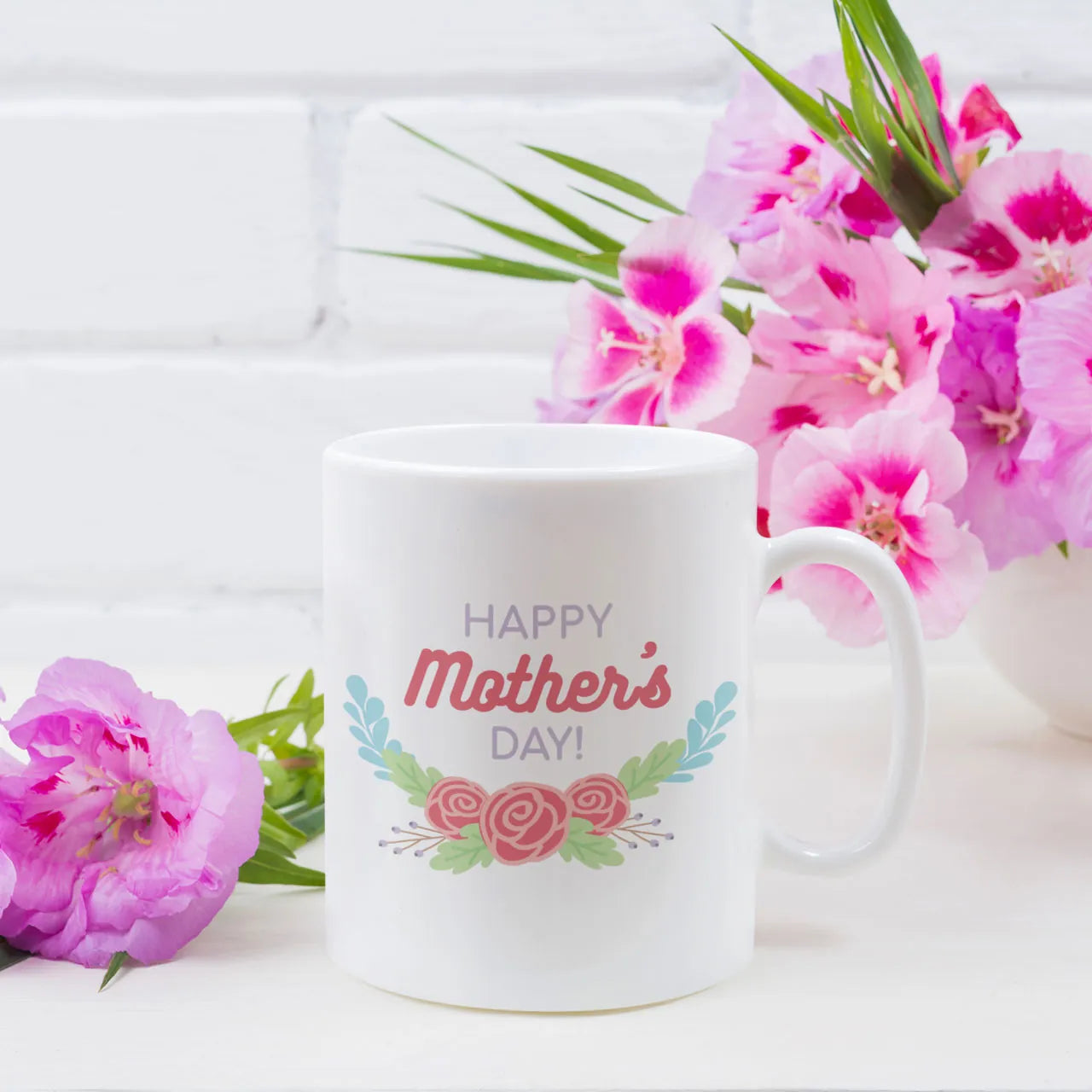 Personalised Mother's Day ceramic mug with a colorful circular floral wreath and custom name, unique gift for Mum UK.