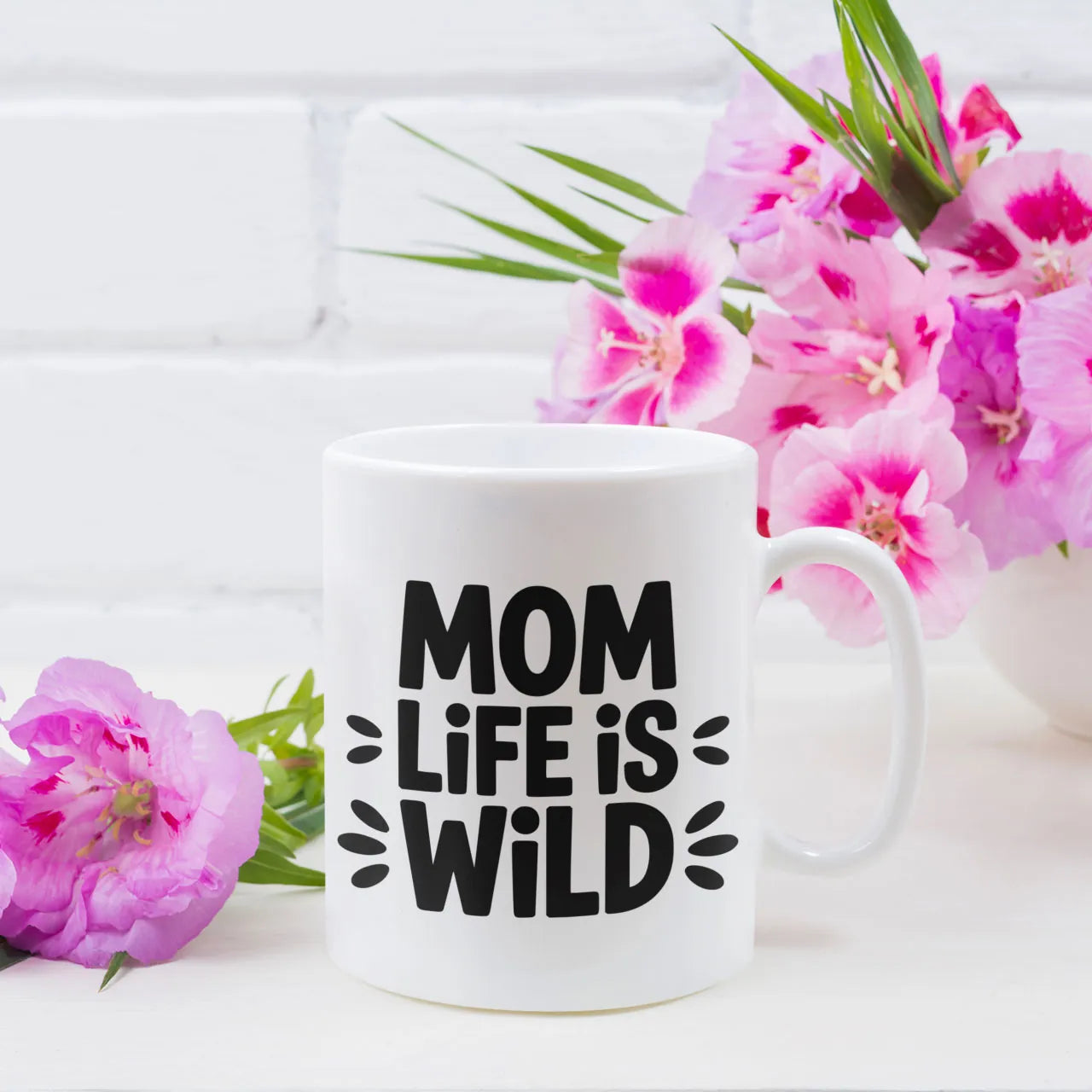 Personalised coffee mug printed with Mom Life Is Wild design, white ceramic gift mug, custom tea cup for Mother's Day.