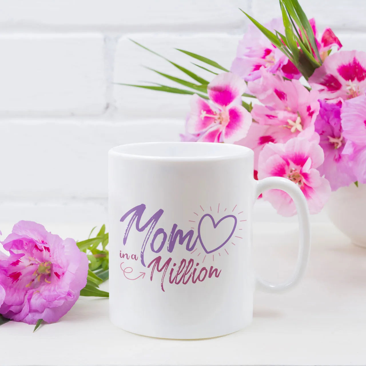 Personalised coffee mug featuring "Mom" text inside a beautiful floral wreath design, white ceramic gift mug, custom tea cup for Mother's Day.