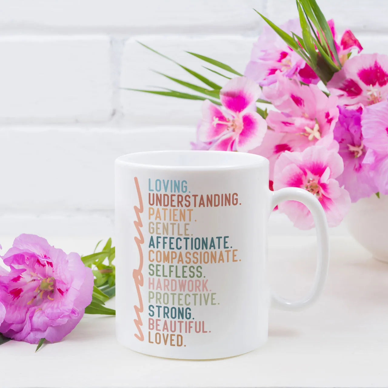 Personalised coffee mug with "Mom Fueled By Coffee" slogan, white ceramic gift mug, custom tea cup for coffee-loving mums on Mother's Day.