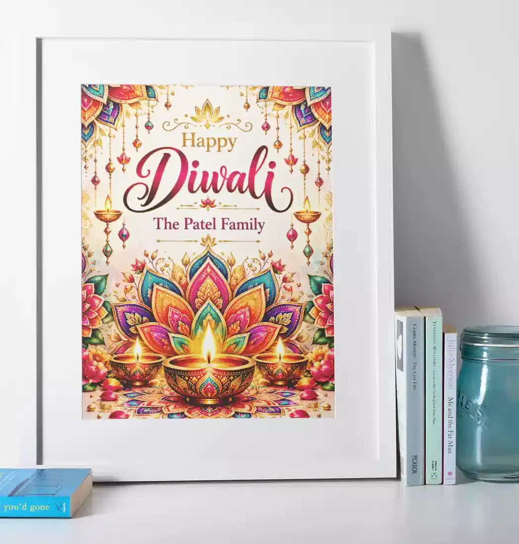 Personalised Diwali lotus mandala print in a white frame, featuring colourful floral petals, Happy Diwali lettering, glowing diyas and custom family name.