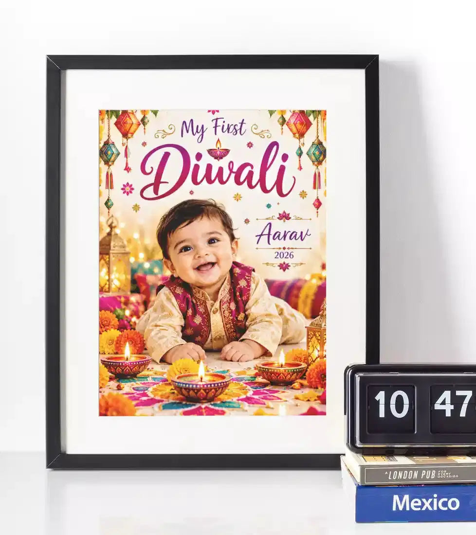 Personalised My First Diwali baby boy photo wall art in a black frame, with vibrant pink lettering, festive decorations, custom photo, name and year.