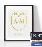 Custom gold monogram crest print with initials and meaningful date, personalised couple wedding or anniversary gift, modern love keepsake art.