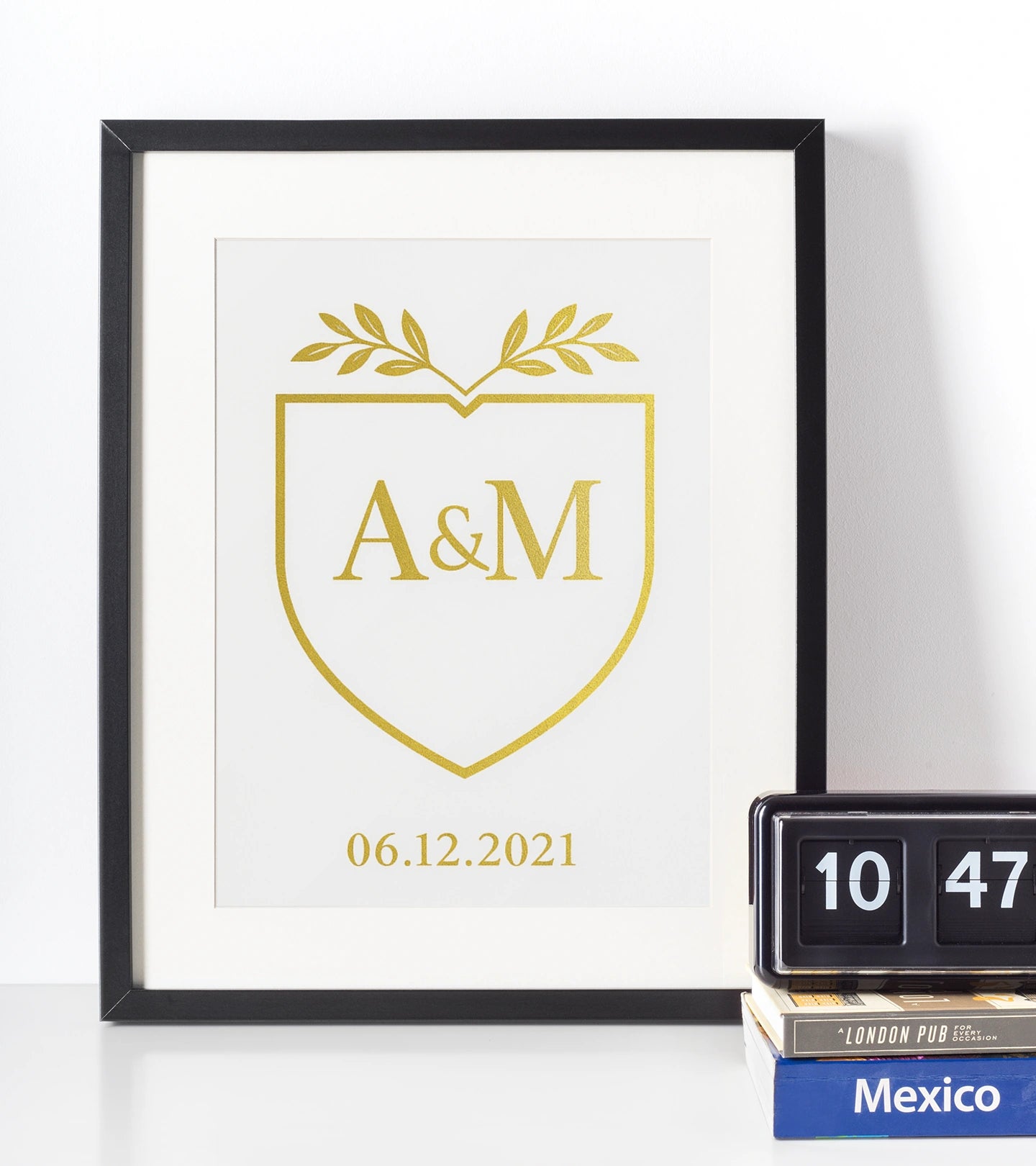 Custom gold monogram crest print with initials and meaningful date, personalised couple wedding or anniversary gift, modern love keepsake art.