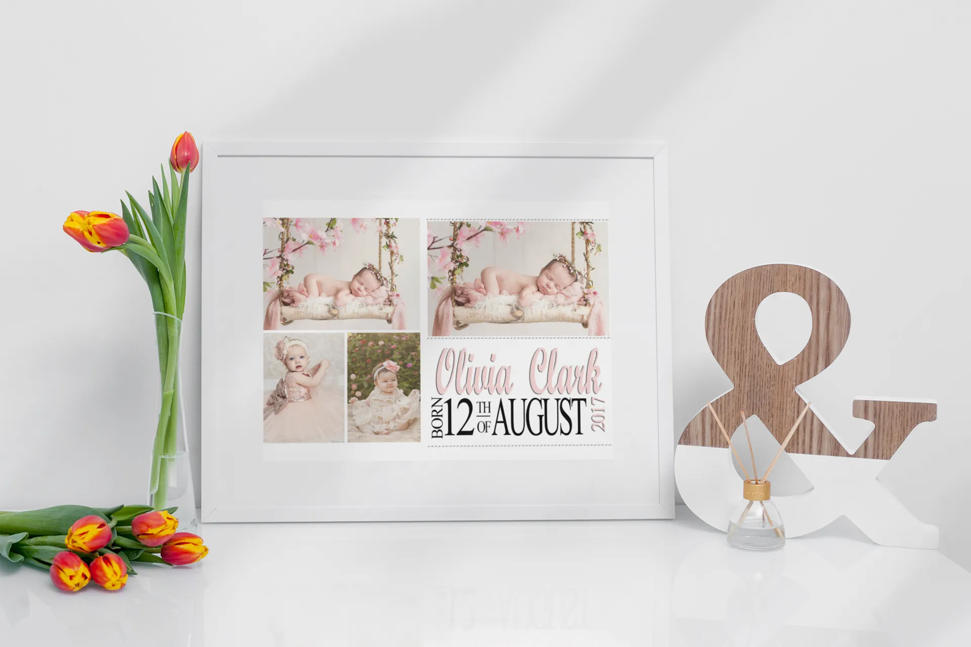 “Personalised baby photo collage with multiple newborn photos, custom name and birth date, displayed in a white frame on a tabletop with tulips and décor.”