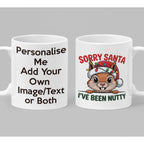 Funny personalised Christmas mug with cute squirrel in Santa hat and lights saying “Sorry Santa I’ve Been Nutty” – festive holiday gift
