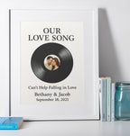 Personalised vinyl record wall art with custom photo, names, song title, and date.