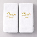 White luxury Bride and Groom towels with gold embroidered names – personalised wedding gift