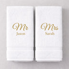 White luxury Mr and Mrs towels with gold embroidered names – personalised wedding gift set